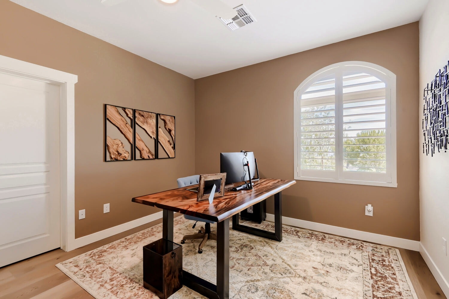 Modern home office with wood desk