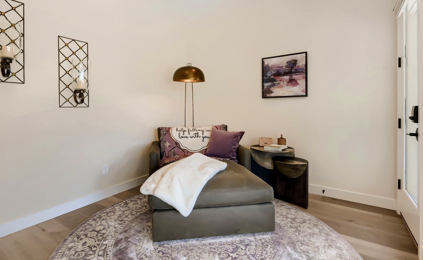Primary suite sitting area with mountain views